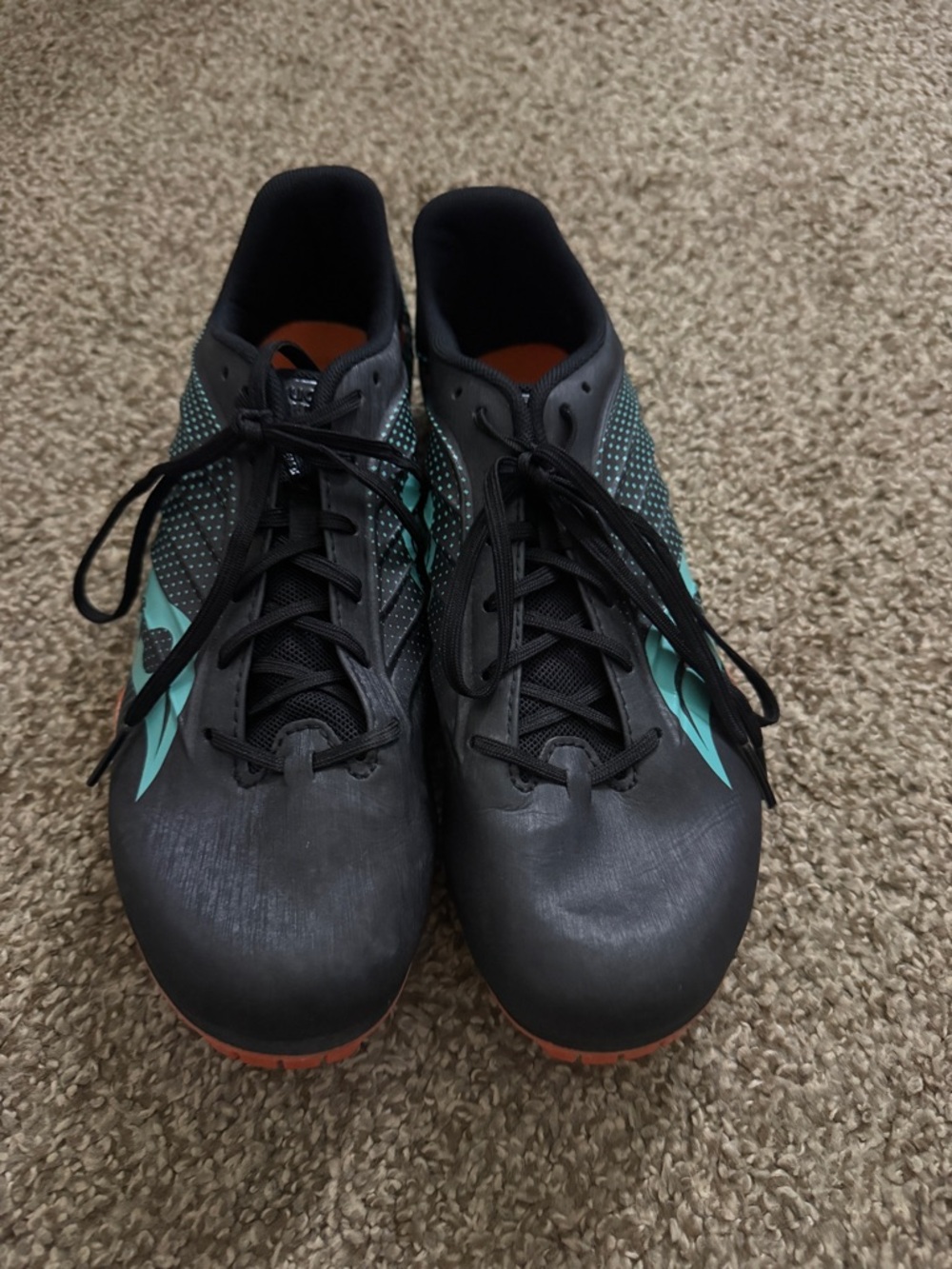 Saucony Women's Black Running Shoes with Teal Accents